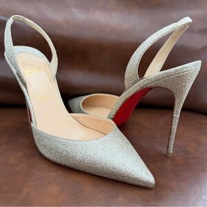 Christian Louboutin Glittering Silver Heels with Red Soles